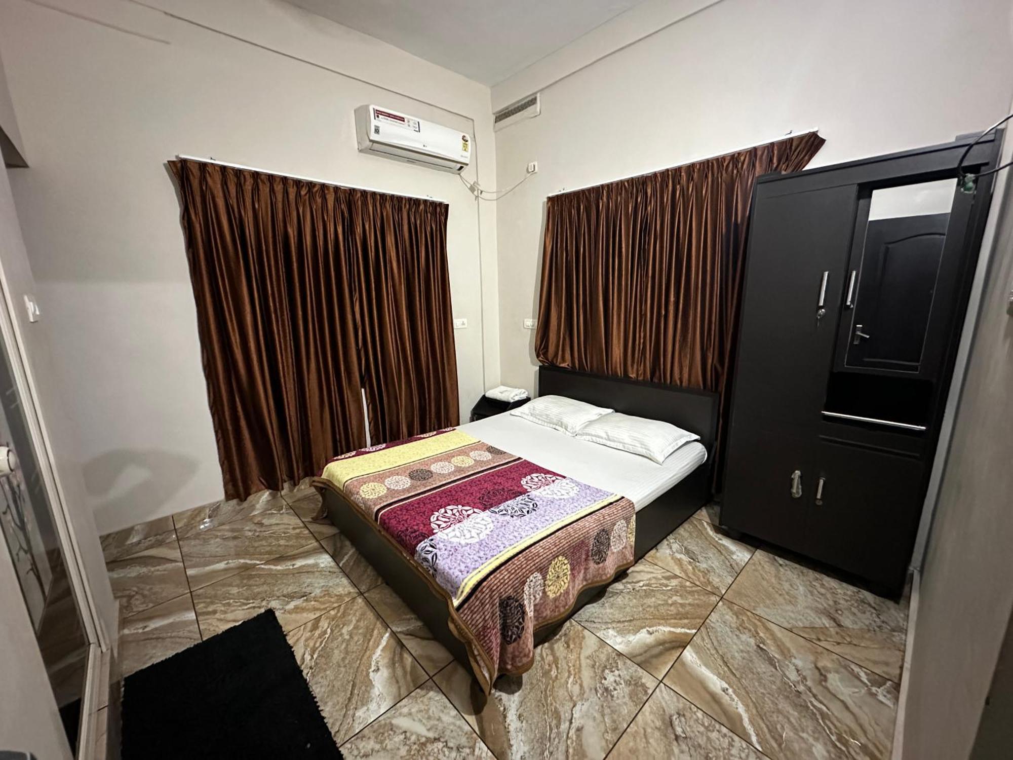 Отель Zahir Residency Kondotty Экстерьер фото